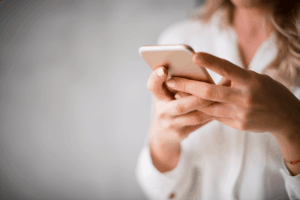 Woman on Facebook searching for healthcare practices being served Meta Ads